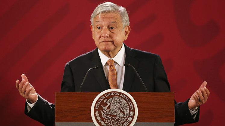 mexico_amlo_lectern_shrugging_stk_747x420